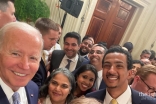 Members of the Ismaili community took an impromptu photo with President Biden during the celebration.