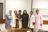 Dr. Anees Chagpar (3rd from left), and Dr. Farin Amersi (4th from left) pose for a photograph with medical students at the Aga Khan University, Karachi.