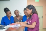 Dr. Lalani training nurses on how to read an ECG, so that heart attacks can be diagnosed rapidly and accurately.