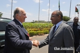 Mawlana Hazar Imam is greeted by Tanzania's Defence Minister Hon. Hussein Mwinyi upon his arrival at Julius Nyerere Airport before departing Tanzania.