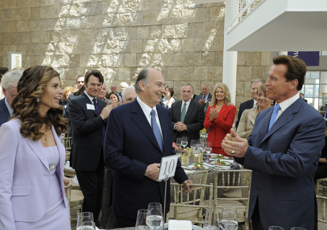 Governor Arnold Schwarzenegger and his wife, First Lady Maria Shriver, are joined by guests in a standing ovation for Mawlana Hazar Imam at a luncheon hosted by the Governor and First Lady of California. 