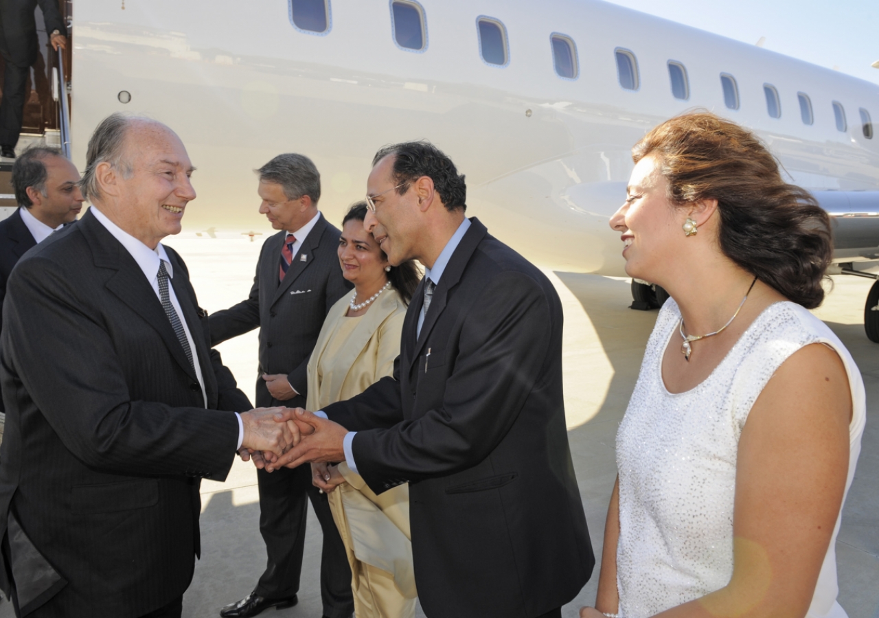 Arriving in Los Angeles, Mawlana Hazar Imam is greeted by President Bashir Sumar of the Ismaili Council for Australia &amp; New Zealand. 