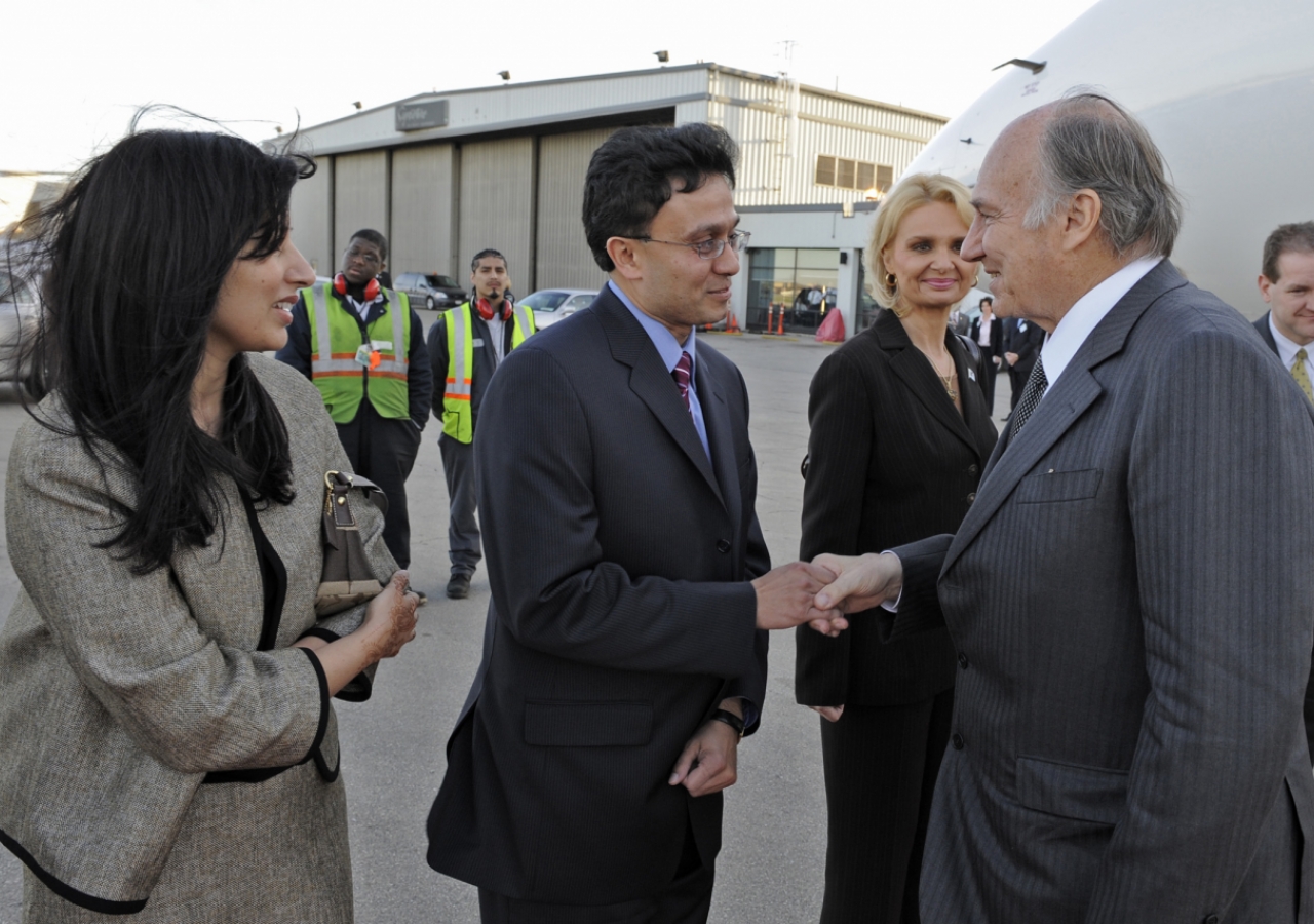 Mawlana Hazar Imam is welcomed by Dr Mansoor Virani, President of the Ismaili Council for the Midwestern USA. 