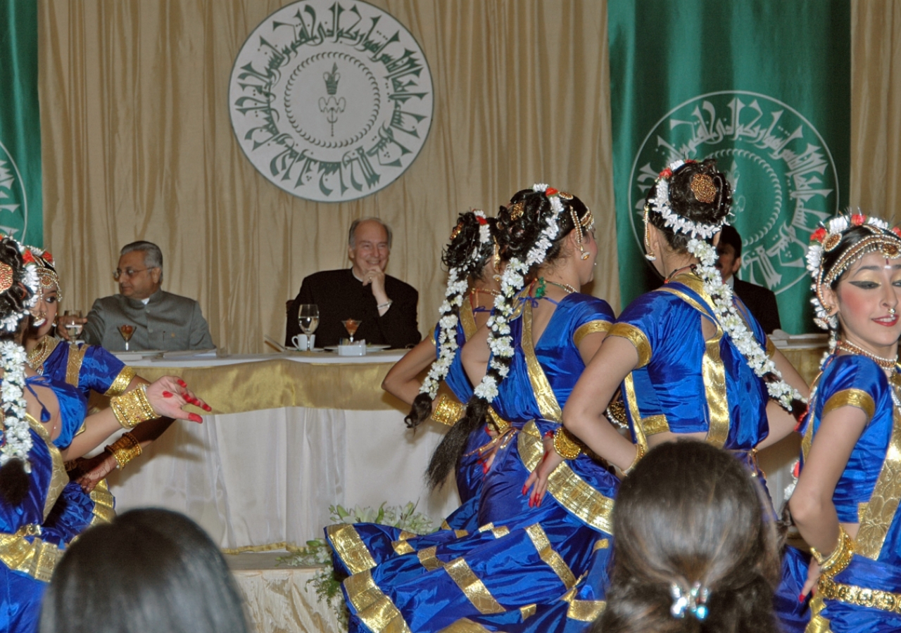 Mawlana Hazar Imam watches a dance performance by young Indian Ismailis at the Jamati Institutional dinner in Mumbai.  