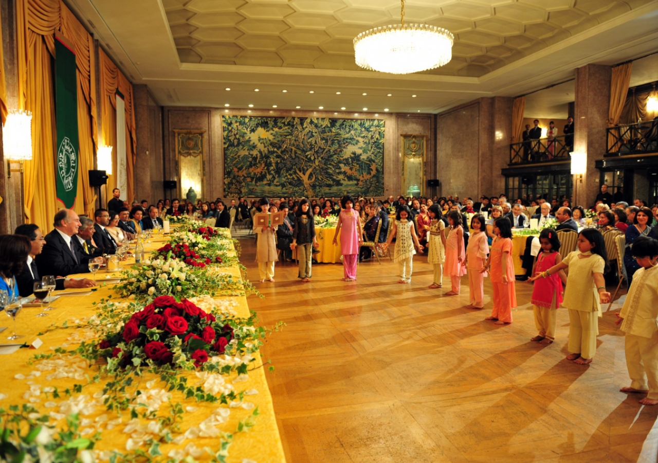 Children perform before Mawlana Hazar Imam at a dinner hosted by the Jamati institutions of Portugal. 