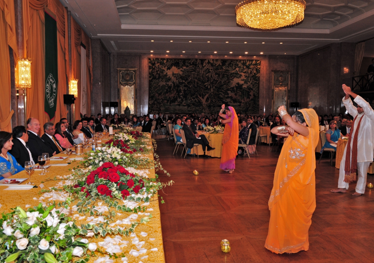 Dancers from the Portuguese Jamat perform before Mawlana Hazar Imam at the Jamati institutional dinner. 