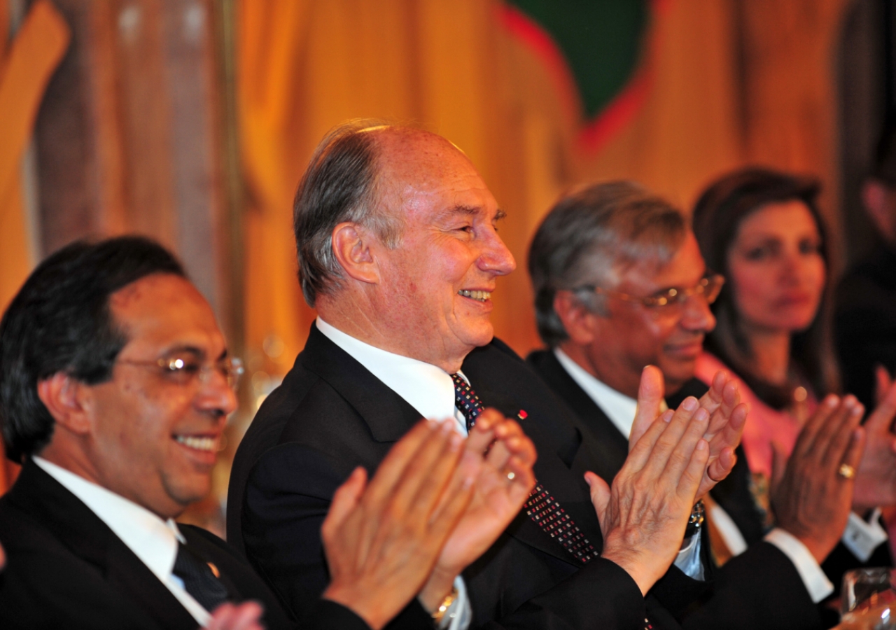 Mawlana Hazar Imam applauds in appreciation of performances presented by members of the Jamat at the institutional dinner in Portugal.  