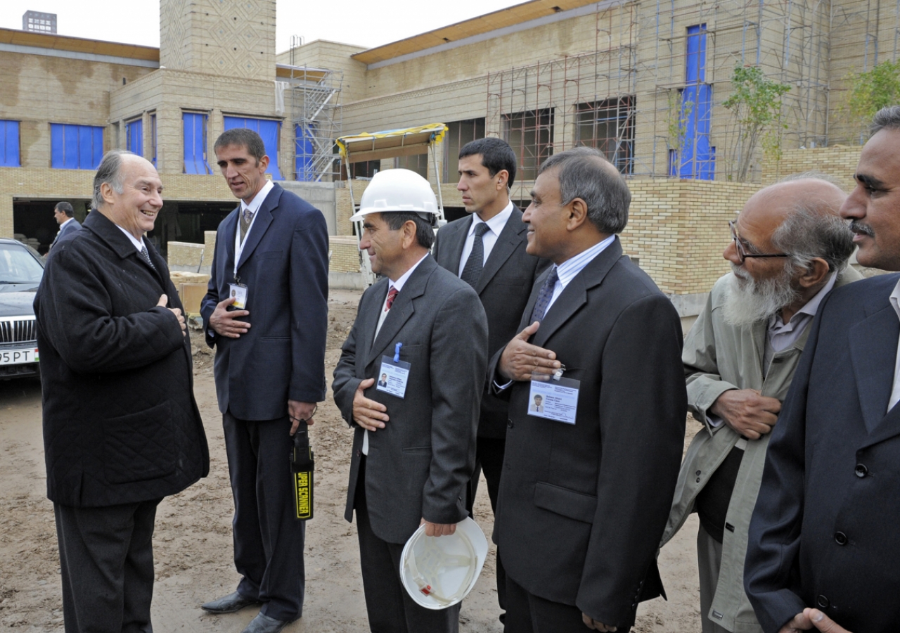 Mawlana Hazar Imam is greeted by staff members during his tour of the Ismaili Centre Dushanbe, which is presently under construction. 