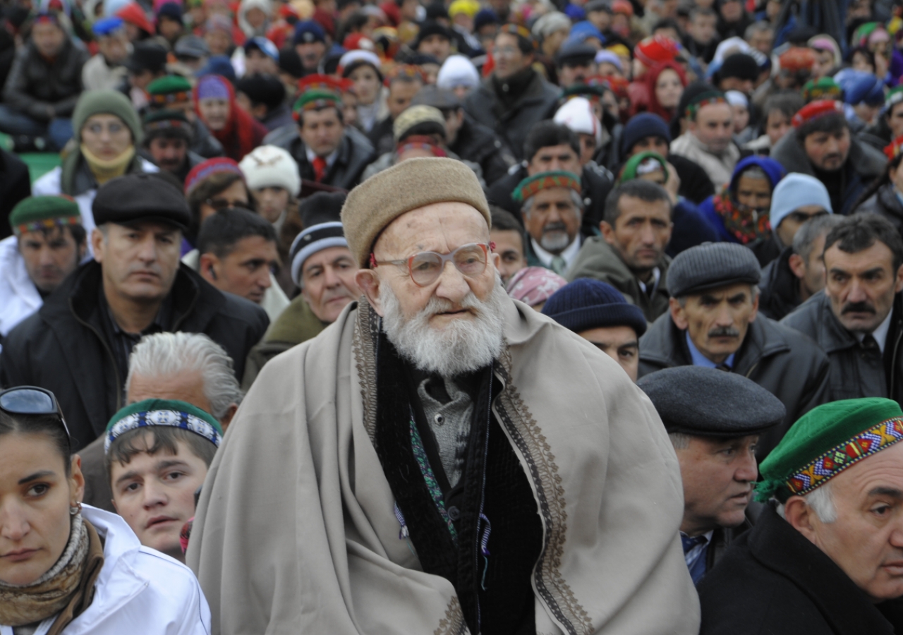 A senior Jamati leader, &amp;ldquo;Shah-i-Khalon,&amp;rdquo; waits together with other murids at Porshinev, in anticipation of Mawlana Hazar Imam’s Darbar.  