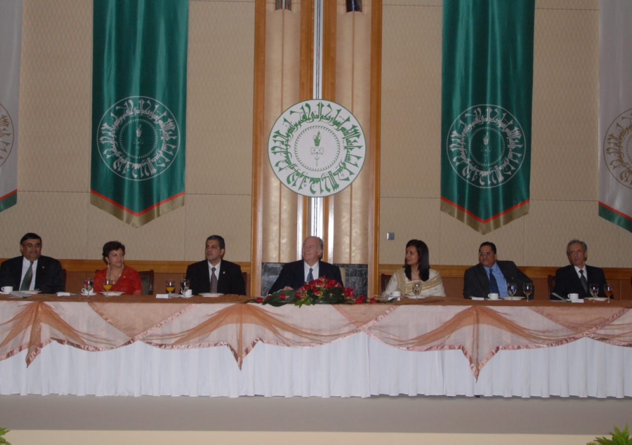 Golden Jubilee banners form an elegant backdrop to the head table where Mawlana Hazar Imam is seated with senior Jamati leaders during a luncheon hosted in his honour by the institutional leadership of the Far East Jamat.  