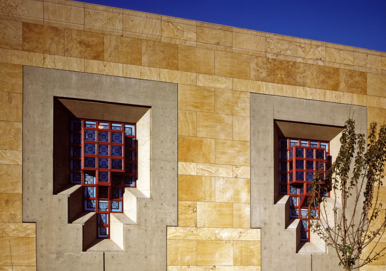 The patterned glass windows take on different colours depending upon the intensity and the direction of light falling upon them.