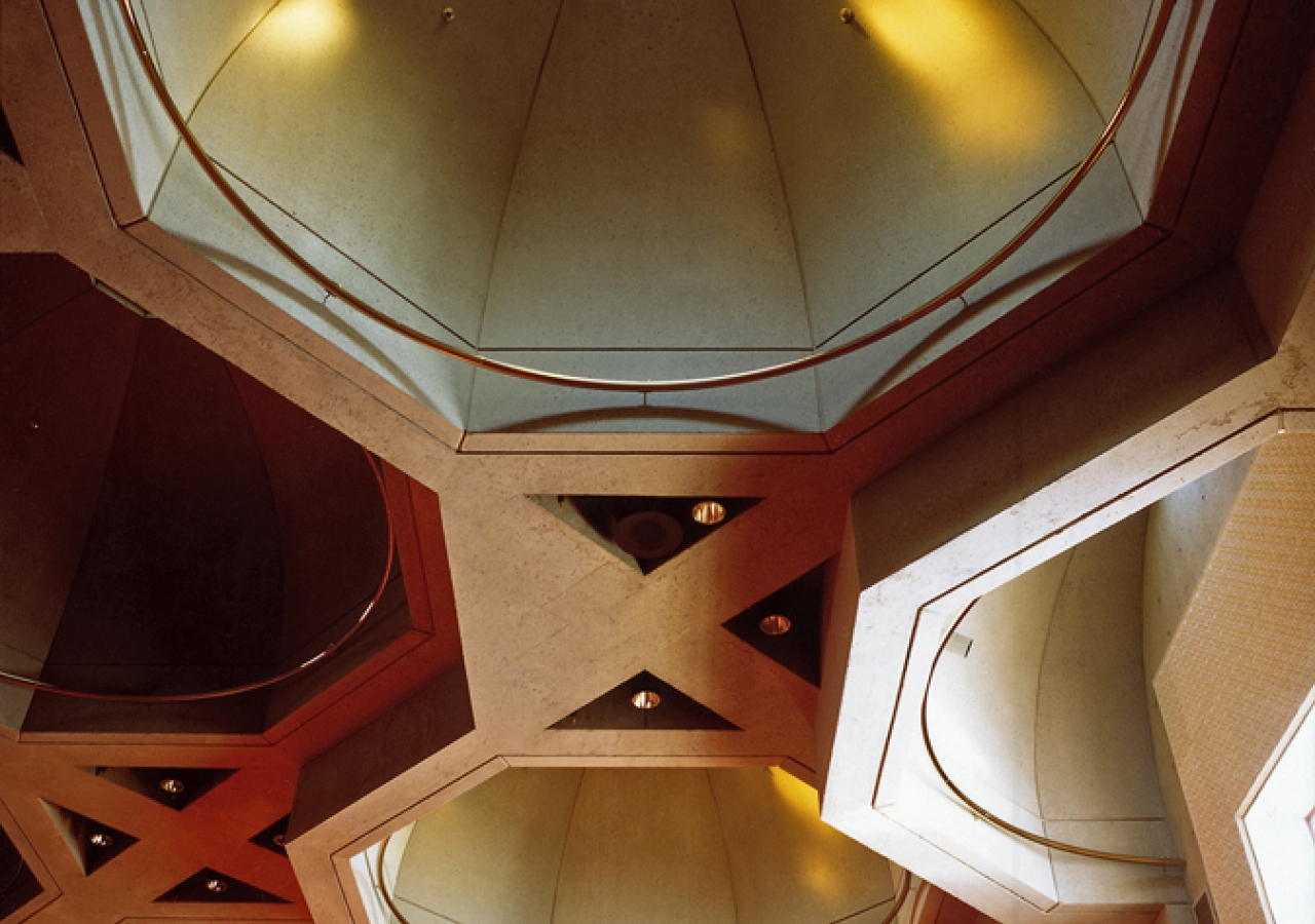 Thirteen octagonal domes with brass circle rings provide natural light.