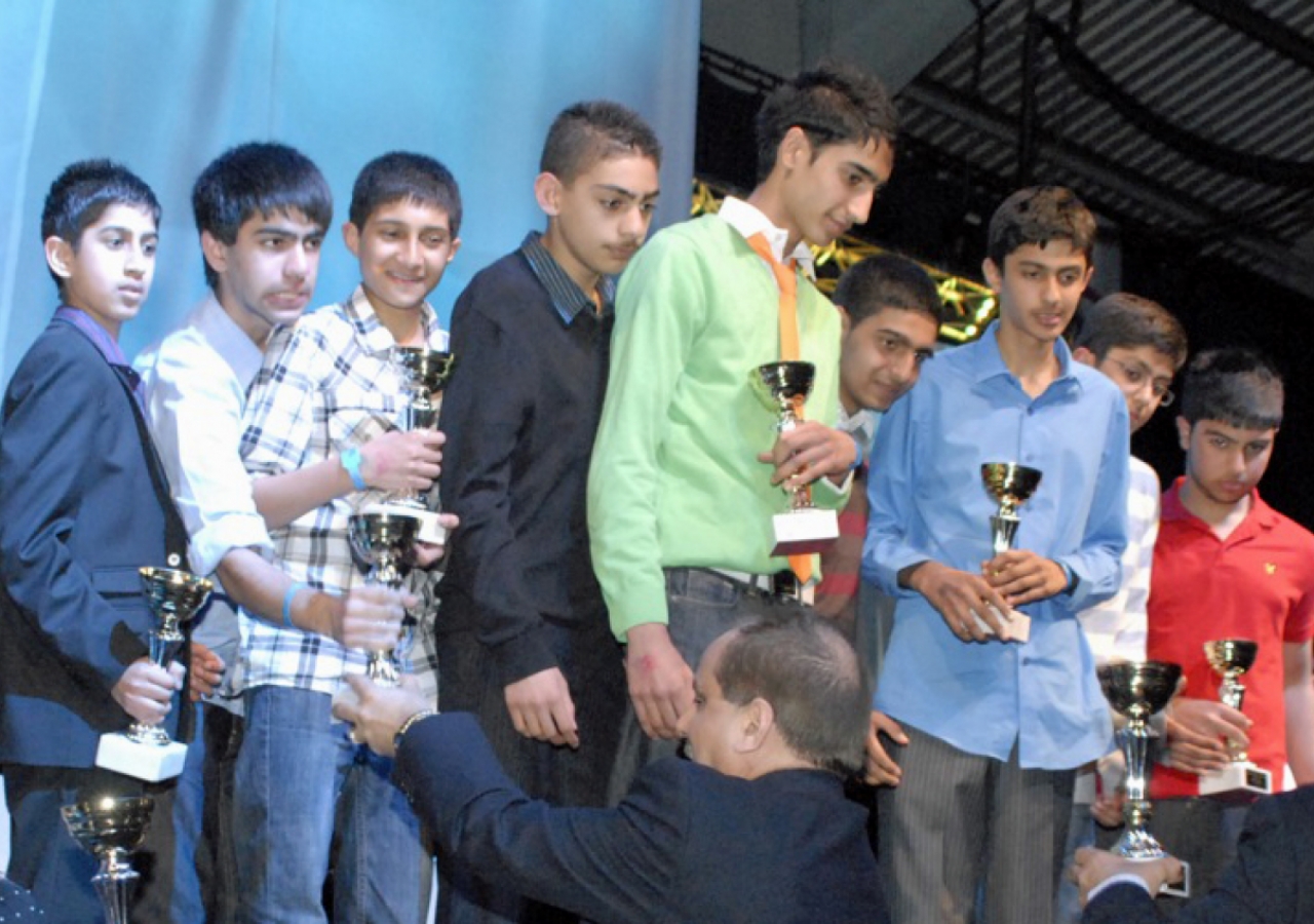 Under-16 Football participants receive their trophies.