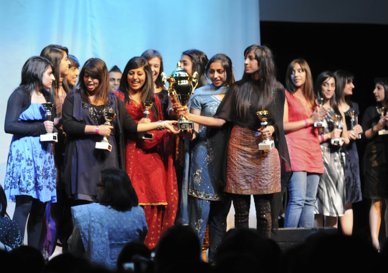 Netball participants celebrate their win at the NSF 2010 awards ceremony.