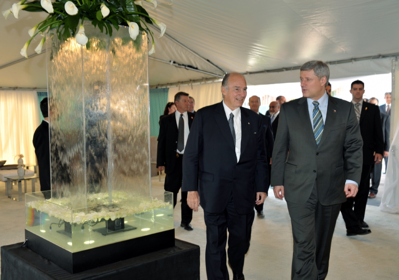 Arriving at the Wynford Drive site for the Foundation Ceremony, Mawlana Hazar Imam and Prime Minister Stephen Harper walk through the Welcome Tent.