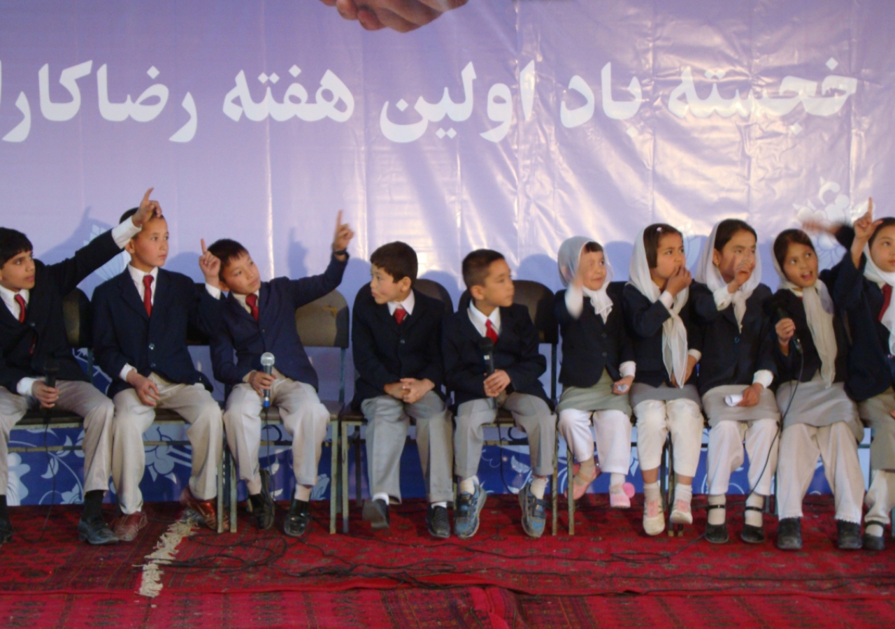 Junior volunteers enthusiastically compete in a Volunteer Week quiz competition held at a Jamatkhana in Kabul, Afghanistan.