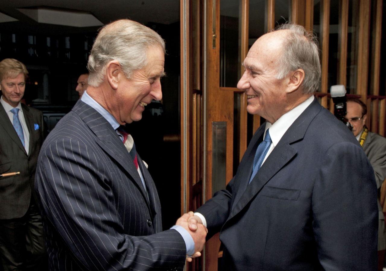 Mawlana Hazar Imam greets His Royal Highness the Prince of Wales at the Ismaili Centre, London. The Prince&amp;rsquo;s visit to the Centre commemorates its 25th anniversary.