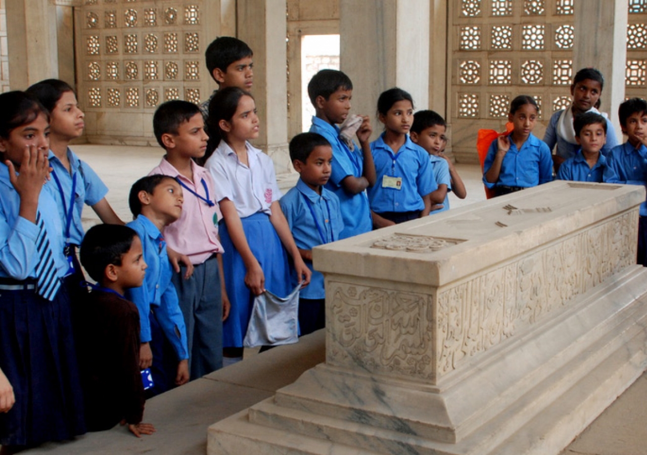 A group of school children in Nizamuddin Basti visit the Chaunsath Khamba, a 17th century tomb. They are guided by AKTC-trained heritage volunteers from the Sair-e-Nizamuddin group.