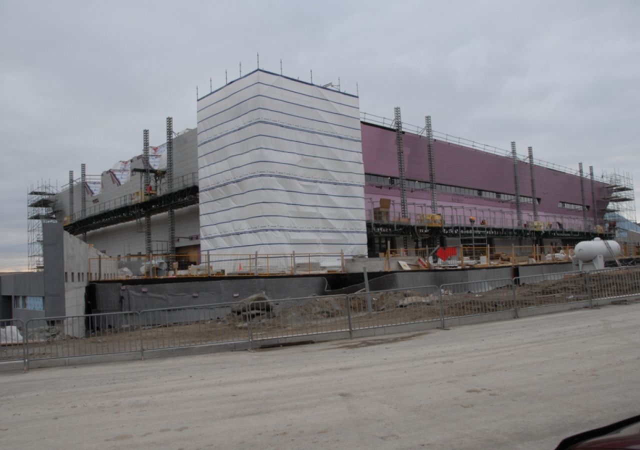 Jan 2012: East and north elevations of the Aga Khan Museum. Installation of stone cladding is progressing on the north elevation, while the pink insulation remains visible on the other side.