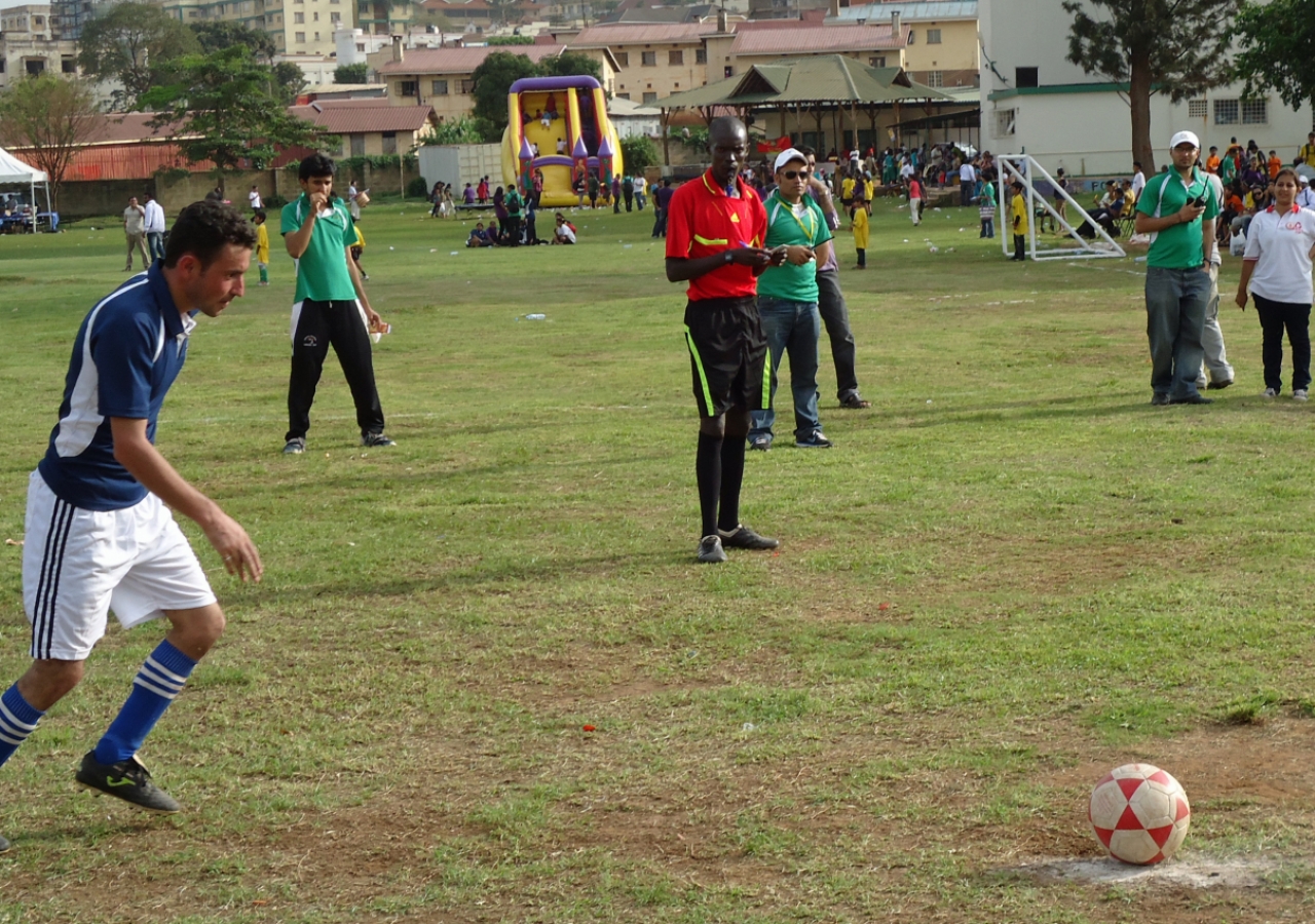 A football player prepares to take a penalty shot at the Ismaili Games Uganda.