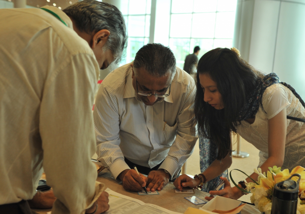 Volunteers prepare for registration ahead of Mawlana Hazar Imam&amp;rsquo;s visit with the Far East Jamat.
