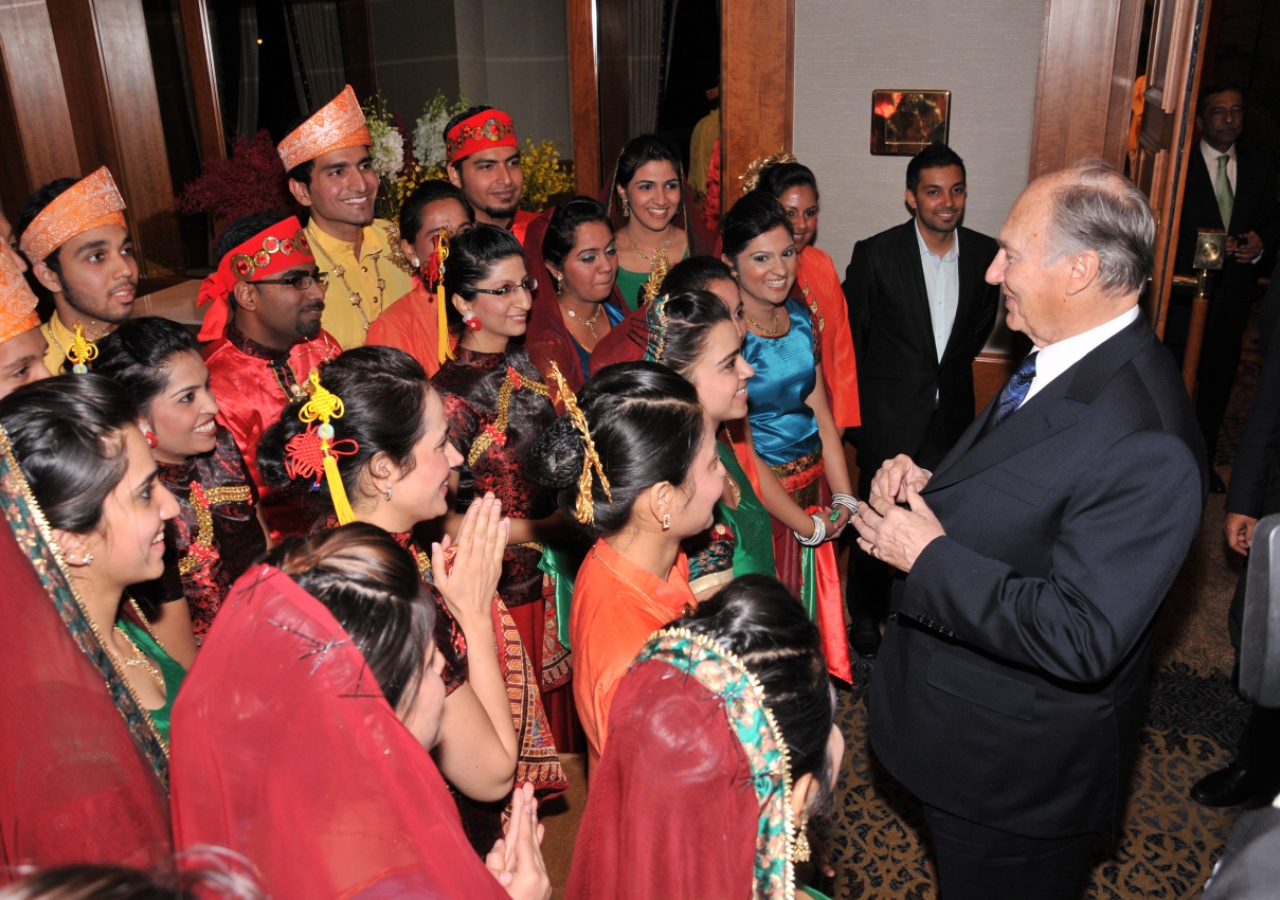 Mawlana Hazar Imam encourages the young performers to consider a &amp;ldquo;dance olympics&amp;rdquo; prior to departing the Far East Institutional Dinner.