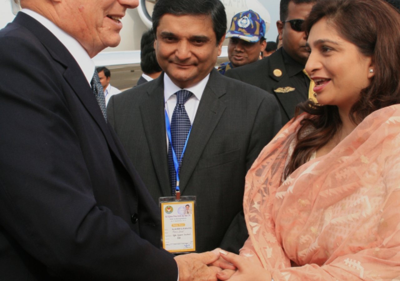 Mawlana Hazar Imam is welcomed to Bangladesh by President Banoo, as Ismaili Council President Rai Sulaiman Ajanee looks on.