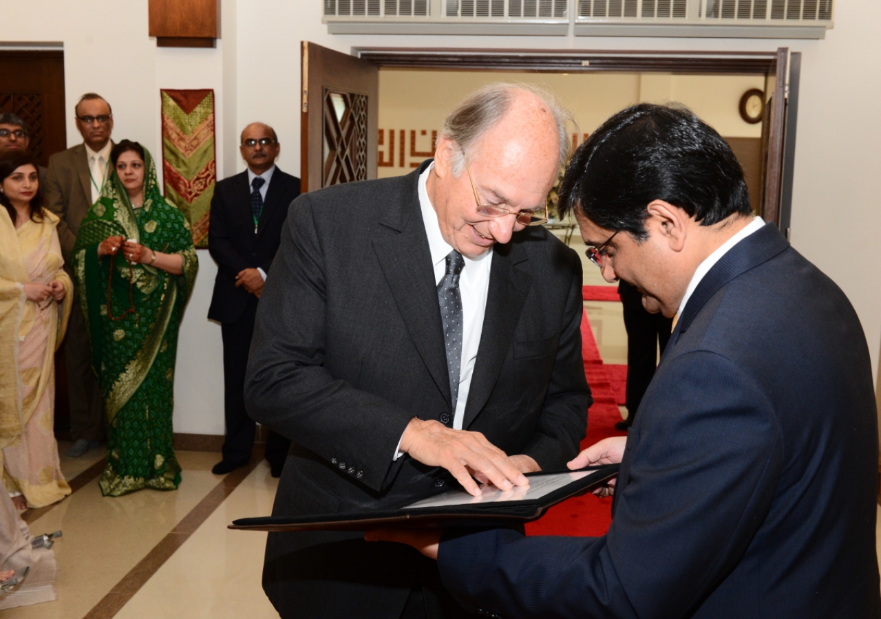 President Ajanee presents Mawlana Hazar Imam with a 19th century Indian dervish staff with a handle formed in the calligraphic name of Ali, and inscriptions that read &amp;ldquo;Ya Ali Madad&amp;rdquo; and &amp;ldquo;Huwa Ya Ali Madad&amp;rdquo;. The gift was presented a