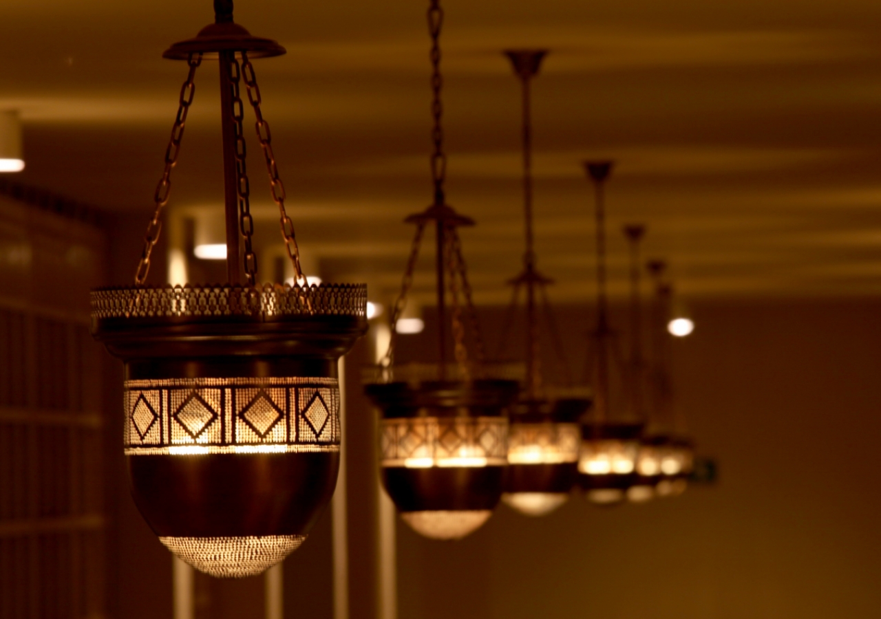 These copper lanterns were fabricated in Iran for the Ismaili Jamatkhana and Centre, Kinshasa, where they hang today.