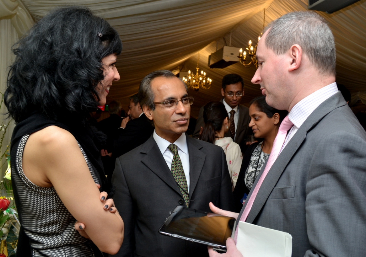 Stephen Williams MP, Parliamentary Under Secretary of State for Communities and Local Government in discussion with representatives of the Jamat.