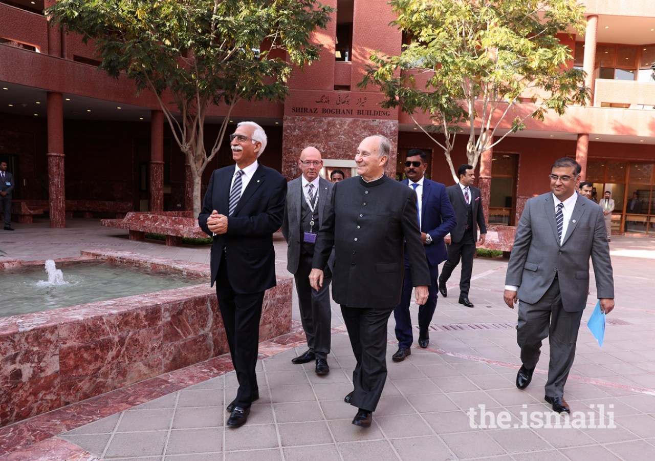 Mawlana Hazar Imam observes the CIME courtyard during a walkabout.