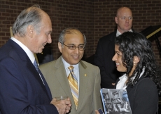 Mawlana Hazar Imam in conversation with an Ismaili involved in the field of Education at the reception following the IBO meeting. Salim Bhatia, Director of the Aga Khan Academies Programme looks on.  