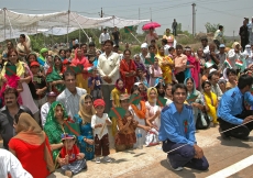 Members of the Jamat in Hyderabad line the streets around the airport in anticipation of Mawlana Hazar Imam's arrival.   