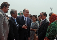 Mawlana Hazar Imam is accompanied by President Habib Hirji of the Ismaili Council for Bangladesh (left), and the Chief Advisor of Bangladesh, Dr Fakhruddin Ahmed (middle), as he is welcomed by Jamati leaders.   