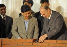 The Honourable Education Adviser of Bangladesh, Dr Hossain Zillur Rahman, joins Mawlana Hazar Imam in laying the foundation of the Aga Khan Academy in Dhaka.  