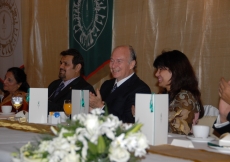 Mawlana Hazar Imam smiles and applauds after a performance by Ismaili dancers at the Jamati institutional dinner in Bangladesh. 