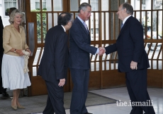 Mawlana Hazar Imam greeting Their Royal Highnesses the Duchess of Cornwall and the Prince of Wales at the Ismaili Centre, London, 12 July 2007.