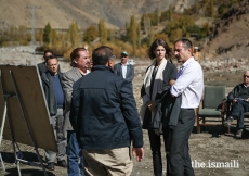 Prince Rahim and Princess Salwa receive a briefing from community leaders and management of the Aga Khan Agency for Habitat (AKAH) on community-based mitigation work undertaken at a disaster-affected site in the village of Darkut, Silgan Valley, Ghizer District, in Gilgit-Baltistan. The village of Darkut is vulnerable to natural hazards including flash floods and rock falls which can destroy houses, farmland and other infrastructure.