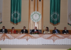 Golden Jubilee banners form an elegant backdrop to the head table where Mawlana Hazar Imam is seated with senior Jamati leaders during a luncheon hosted in his honour by the institutional leadership of the Far East Jamat.  