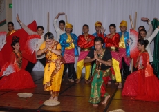 During the Jamati institutional luncheon, dancers present a performance before Mawlana Hazar Imam that highlights the cultures of the eleven countries in which the Far East Jamat resides. 