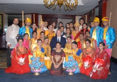 Performers from the Far East Jamat gather for a photograph with Mawlana Hazar Imam at the conclusion of the Jamati institutional luncheon in Singapore. 