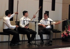 A trio of graduates from the Academy of Maqam, supported by the Aga Khan Trust for Culture, plays traditional Tajik music at the Imamat Day Reception.