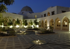 Fountains of arboreal calm: the Takhtabosh Courtyard at dusk.