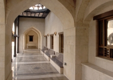 Shaded benches look out onto the courtyard.