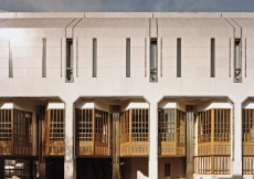 Detail showing windows and panels in stainless steel, teak and bevelled glass, with three different surface finishes to the granite.