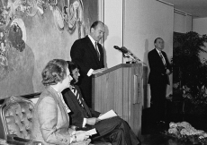 Mawlana Hazar Imam addresses the audience at the Opening Ceremony of the Ismaili Centre, London, as Prime Minister Margaret Thatcher and Ismaili Council President Anil Ishani look on.