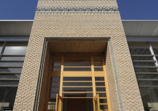 Looking up at the Youth and Education Portal from the Great Courtyard.