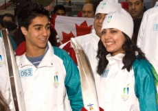 Darbir Rashid and Zoya Jiwa celebrate after their torch run.