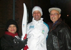 Following his Olympic Torch run in Hamilton, Ontario, Ashif Ratanshi poses for a photograph with his parents, Zarin and Nizar.