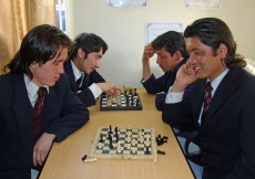 Volunteers face off over a game of chess as part of the Volunteer Week celebration in Afghanistan.